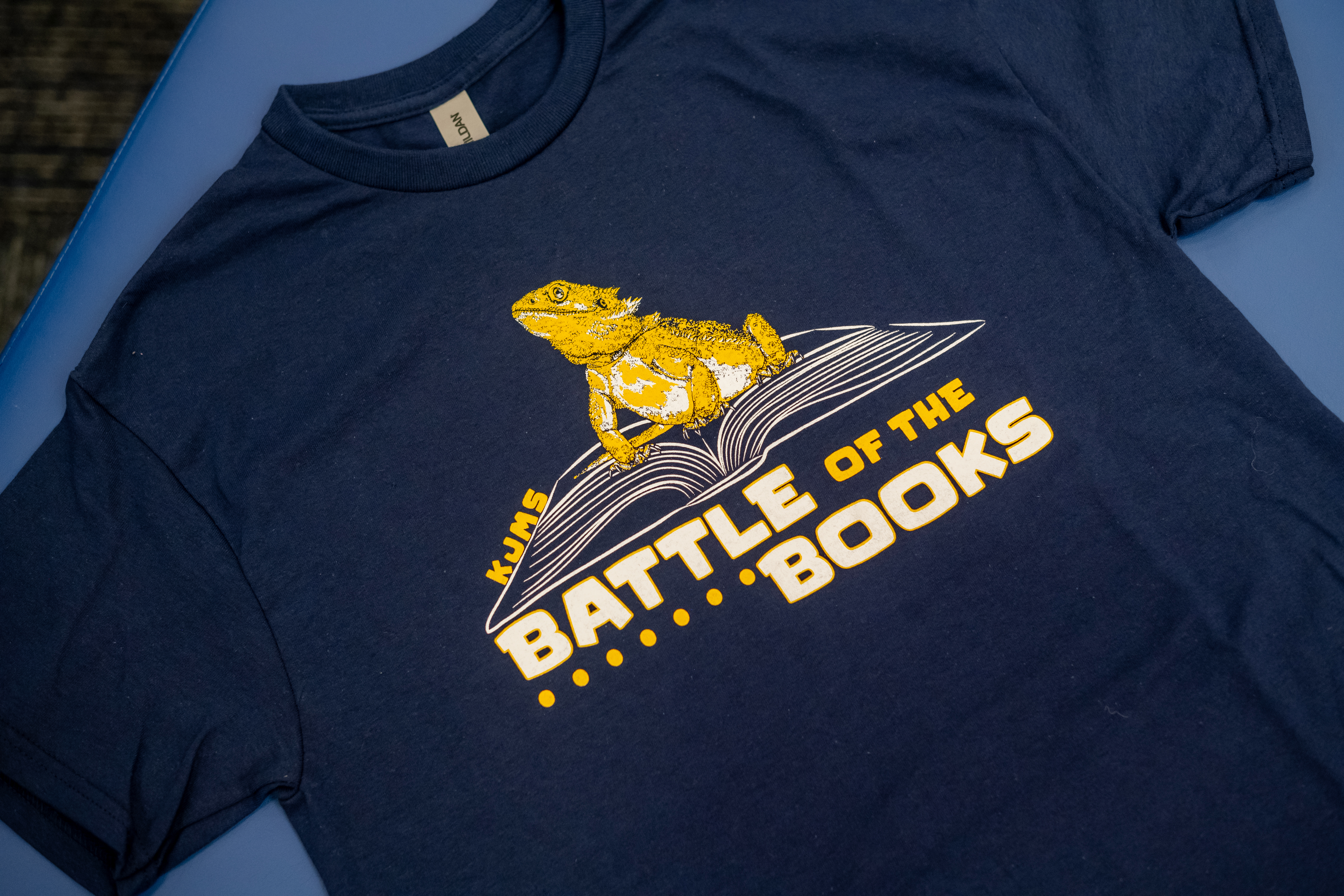 KJMS Battle of the Books t shirt featuring a bearded dragon. 